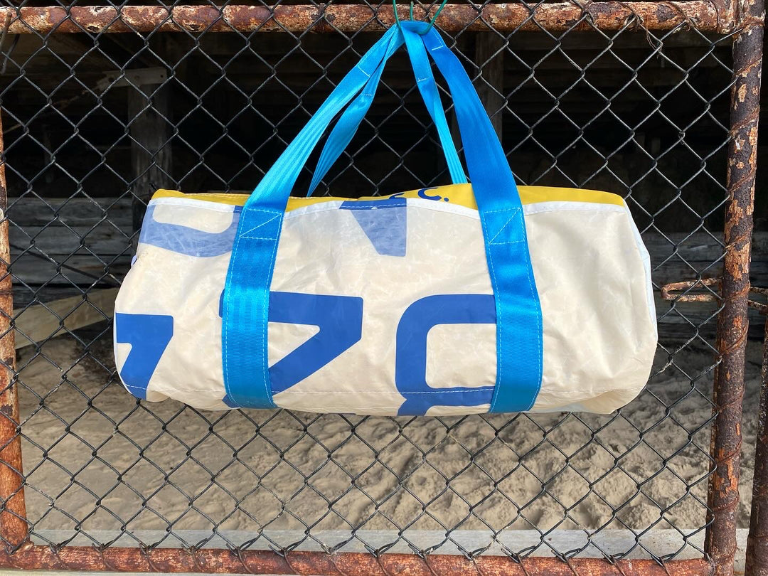 Roaring 40's Gear Bag in Yellow, Blue and White with abstracted AUS text