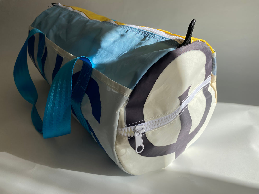 Roaring 40's Gear Bag in Yellow, Blue and White with abstracted AUS text